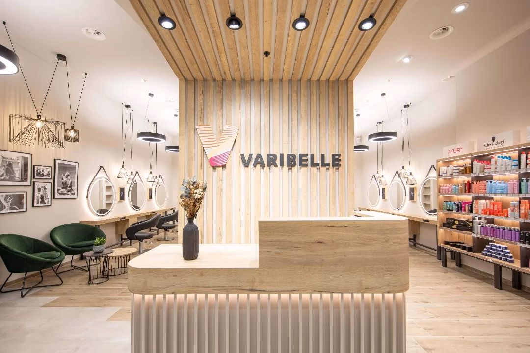 Wer gründete das Coiffeurgeschäft in Luzern?