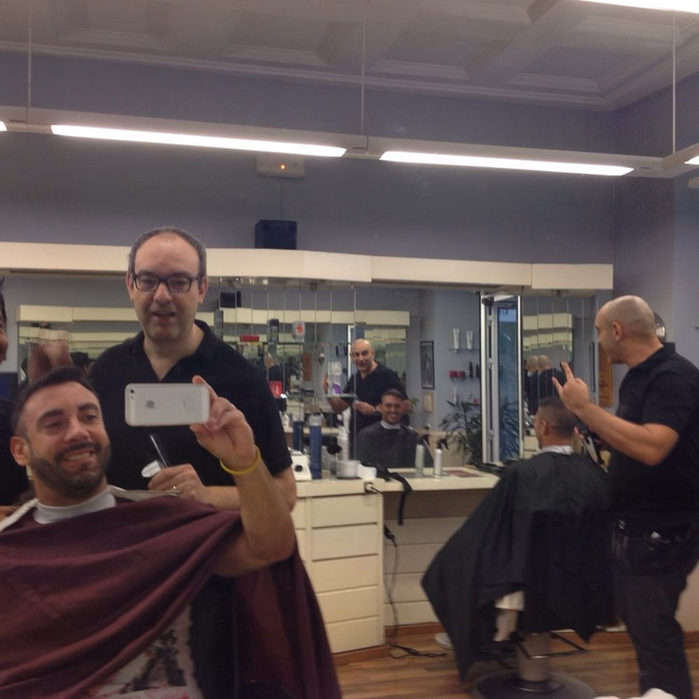 What are people saying about men's hair salons in Madrid?