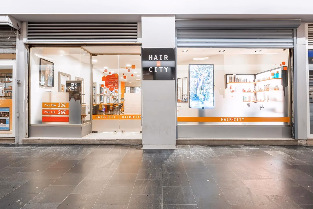 Pourquoi le barbershop de Vanves s'appelle-t-il 'The Downtown Barbershop' ?