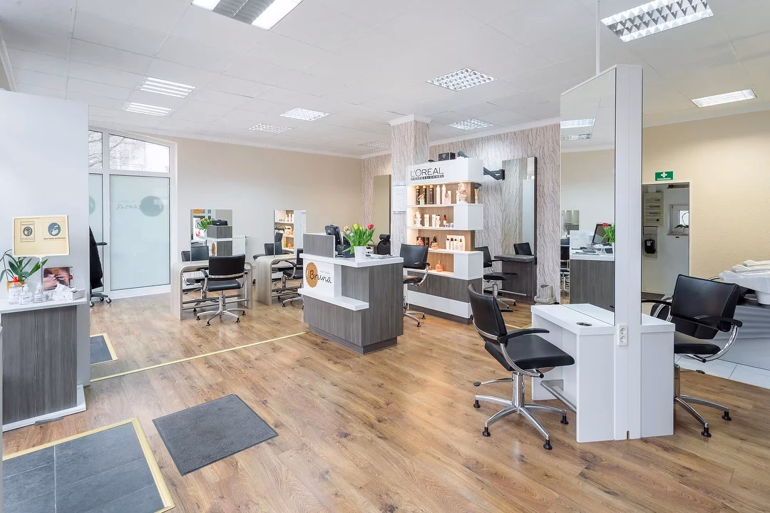 Wie kann ich einen Friseur vereinbaren?